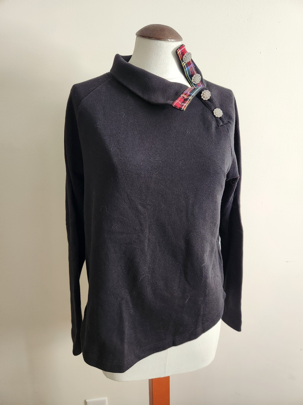 Black Pullover Top with Tartan Button Detail